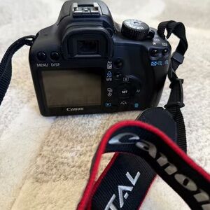 Canon Black Digital Camera with Red Accents